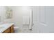 Practical bathroom with a single sink vanity, tile floor, and a shower/tub combination at 15543 Quivas St, Broomfield, CO 80023