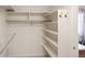 Walk-in closet with shelves for optimal storage at 15543 Quivas St, Broomfield, CO 80023