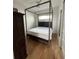 A well-lit bedroom with hardwood floors and comfortable bed at 1284 Osceola St, Denver, CO 80204