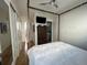 Bedroom with wooden four-poster bed and hardwood flooring at 1284 Osceola St, Denver, CO 80204