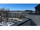Scenic city view of neighborhood buildings and mountains in the background on a clear day at 1284 Osceola St, Denver, CO 80204