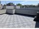 This rooftop deck features deck pavers and great views at 1284 Osceola St, Denver, CO 80204