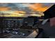 Stunning sunset view over the city buildings with colorful clouds and visible horizon at 1284 Osceola St, Denver, CO 80204