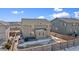 Home's backyard features a concrete patio and wooden fence at 7967 E 139Th Pl, Thornton, CO 80602