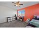 Bedroom with a twin bed and a desk with great natural light at 7967 E 139Th Pl, Thornton, CO 80602