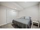 Cozy bedroom features soft gray carpet, white walls, and closet at 7967 E 139Th Pl, Thornton, CO 80602