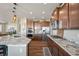 Gourmet kitchen boasts granite countertops, stainless steel appliances, and ample cabinet space at 7967 E 139Th Pl, Thornton, CO 80602