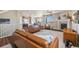 Open-concept living room seamlessly connects to the modern kitchen and dining area at 7967 E 139Th Pl, Thornton, CO 80602