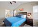 Spacious primary bedroom featuring a vaulted ceiling and an ensuite bathroom at 7967 E 139Th Pl, Thornton, CO 80602