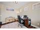 Bright office features a piano, a work station, and a neutral color palette at 7967 E 139Th Pl, Thornton, CO 80602