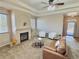 Comfortable living room with a fireplace, perfect for relaxing and entertaining guests in a cozy setting at 6321 Spring Gulch St, Frederick, CO 80516