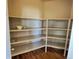 Walk-in pantry with ample shelving, providing convenient storage for all your kitchen essentials and supplies at 6321 Spring Gulch St, Frederick, CO 80516