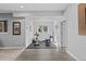 Finished basement with exercise equipment, rubber flooring, natural light, and light grey walls at 5322 Devils Head Cir, Golden, CO 80403