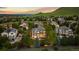Spacious home with manicured lawn, mature trees, and a deck perfect for outdoor enjoyment at 5322 Devils Head Cir, Golden, CO 80403