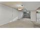 Carpeted basement area featuring a retro coca-cola light fixture at 380 E 111Th Pl, Northglenn, CO 80233