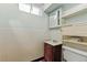 Classic bathroom with tiled walls and a vanity at 380 E 111Th Pl, Northglenn, CO 80233
