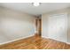 Bright bedroom with hardwood floors, fresh paint, and a closet awaits personal touches at 380 E 111Th Pl, Northglenn, CO 80233