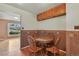 Charming breakfast nook featuring a glass table and a view of the neighborhood at 380 E 111Th Pl, Northglenn, CO 80233
