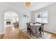 Bright dining area with hardwood floors and natural light, ideal for Gathering meals at 1220 Magnolia St, Denver, CO 80220