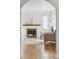 Bright living room with fireplace and hardwood floors at 1220 Magnolia St, Denver, CO 80220