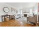 Light-filled living room features hardwood floors, fireplace, and stylish furnishings at 1220 Magnolia St, Denver, CO 80220