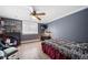 Basement bedroom with a bed and ceiling fan at 2095 Newland St, Edgewater, CO 80214