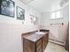Simple bathroom with shower/tub combo and vanity at 2095 Newland St, Edgewater, CO 80214
