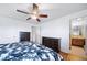 Bedroom with ensuite bathroom and hardwood floors at 2095 Newland St, Edgewater, CO 80214
