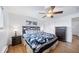 Bedroom featuring hardwood floors, ceiling fan, and natural light at 2095 Newland St, Edgewater, CO 80214