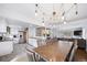 Open concept dining area, kitchen and Gathering room at 2095 Newland St, Edgewater, CO 80214