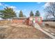 Brick ranch house with a spacious backyard and access to the home at 2095 Newland St, Edgewater, CO 80214