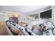 Bright and airy living room with large windows and comfortable seating at 2095 Newland St, Edgewater, CO 80214