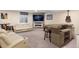 Finished basement with wet bar, fireplace and seating area at 3140 S Nepal Way, Aurora, CO 80013