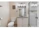 Clean bathroom with granite vanity and shower at 3140 S Nepal Way, Aurora, CO 80013