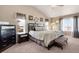 Large main bedroom with ample natural light and carpet flooring at 3140 S Nepal Way, Aurora, CO 80013