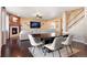 Dining room with hardwood floors and large rectangular table at 3140 S Nepal Way, Aurora, CO 80013