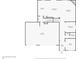 First floor plan, showing kitchen, living areas, and garage at 3140 S Nepal Way, Aurora, CO 80013