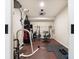 Well-equipped home gym featuring flooring, weights, and a heavy bag at 3140 S Nepal Way, Aurora, CO 80013