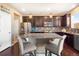 Spacious kitchen with granite countertops and stainless steel appliances at 3140 S Nepal Way, Aurora, CO 80013