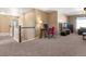 Spacious loft area with TV, desk and sitting area at 3140 S Nepal Way, Aurora, CO 80013