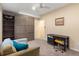 Room with a pull-down bed, desk, and shelving at 3140 S Nepal Way, Aurora, CO 80013