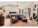 Spacious main bedroom offers a fireplace, sitting area, and access to the outside at 24860 N Mountain Park Dr, Evergreen, CO 80439