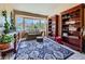 Bright and inviting living area with a bay window, comfortable seating, and stylish decor at 3859 Rawhide Cir, Castle Rock, CO 80104