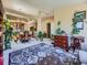 Open living and dining area featuring plants, and a decorative rug creating an inviting atmosphere at 3859 Rawhide Cir, Castle Rock, CO 80104