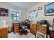 Functional home office with built-in desk and ample storage at 3859 Rawhide Cir, Castle Rock, CO 80104