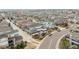 An aerial view of a large neighborhood with colorful homes and well-maintained streets at 9791 Dunning Cir, Highlands Ranch, CO 80126