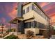 Contemporary two-story home with stylish siding, covered porch, and low-maintenance landscaping at 9791 Dunning Cir, Highlands Ranch, CO 80126