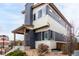 Charming two-story home featuring a modern design with a covered porch, and low maintenance landscaping at 9791 Dunning Cir, Highlands Ranch, CO 80126