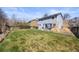 Large back yard provides ample space for recreation, featuring a patio and lush lawn at 11753 Elizabeth Cir, Thornton, CO 80233