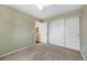 Serene bedroom with carpet and closet offers a peaceful escape, accessible from the hallway at 11753 Elizabeth Cir, Thornton, CO 80233